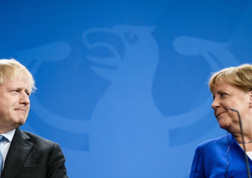 Борис Джонсън и Ангела Меркел режат Русия за връщане в Г-8